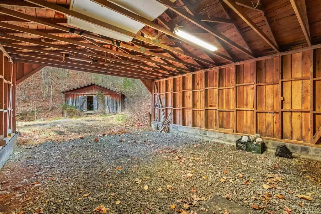 Log Cabin for Sale in Cosby Tennessee on 50 Acres with Pond, Cabins, and Mountain Views 3099 Mica Way, Cosby, TN 37722 Scottie Hooper realtor Cosby Tennessee