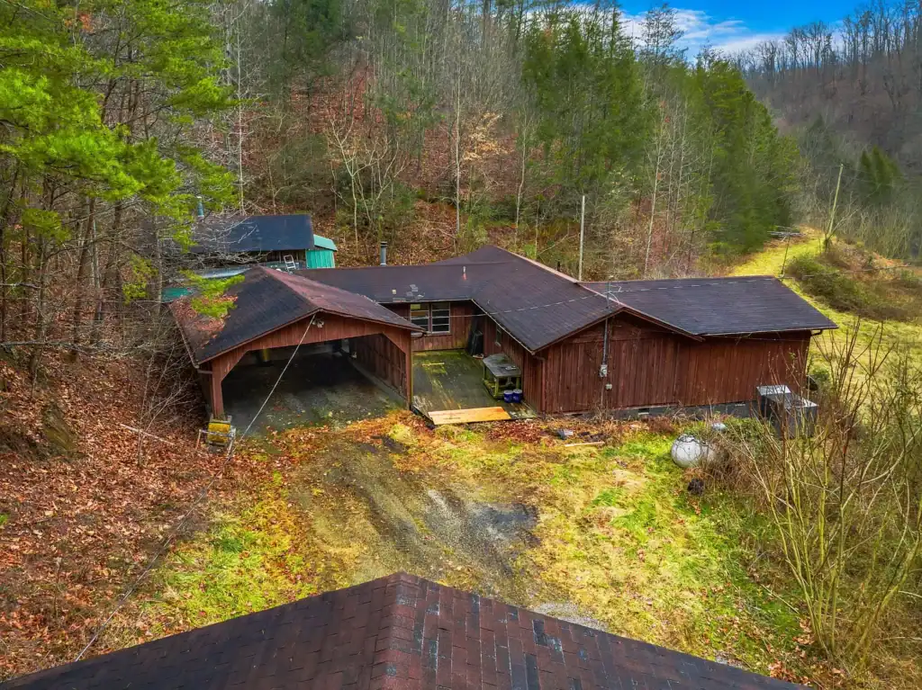 Log Cabin for Sale in Cosby Tennessee on 50 Acres with Pond, Cabins, and Mountain Views 3099 Mica Way, Cosby, TN 37722 Scottie Hooper realtor Cosby Tennessee