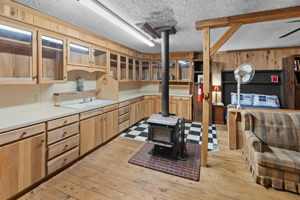 Log Cabin for Sale in Cosby Tennessee on 50 Acres with Pond, Cabins, and Mountain Views 3099 Mica Way, Cosby, TN 37722 Scottie Hooper realtor Cosby Tennessee