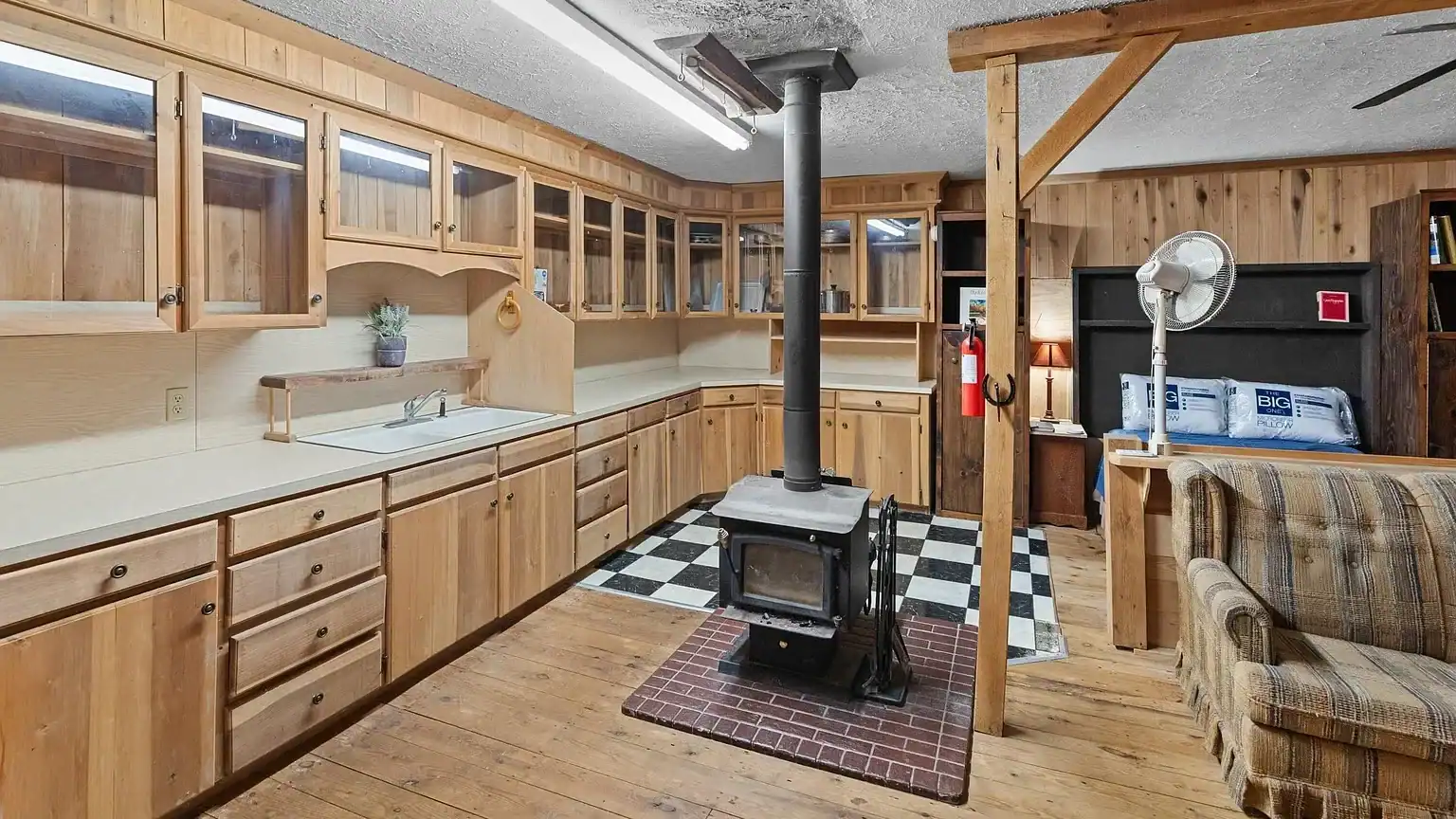 Log Cabin for Sale in Cosby Tennessee on 50 Acres with Pond, Cabins, and Mountain Views 3099 Mica Way, Cosby, TN 37722 Scottie Hooper realtor Cosby Tennessee