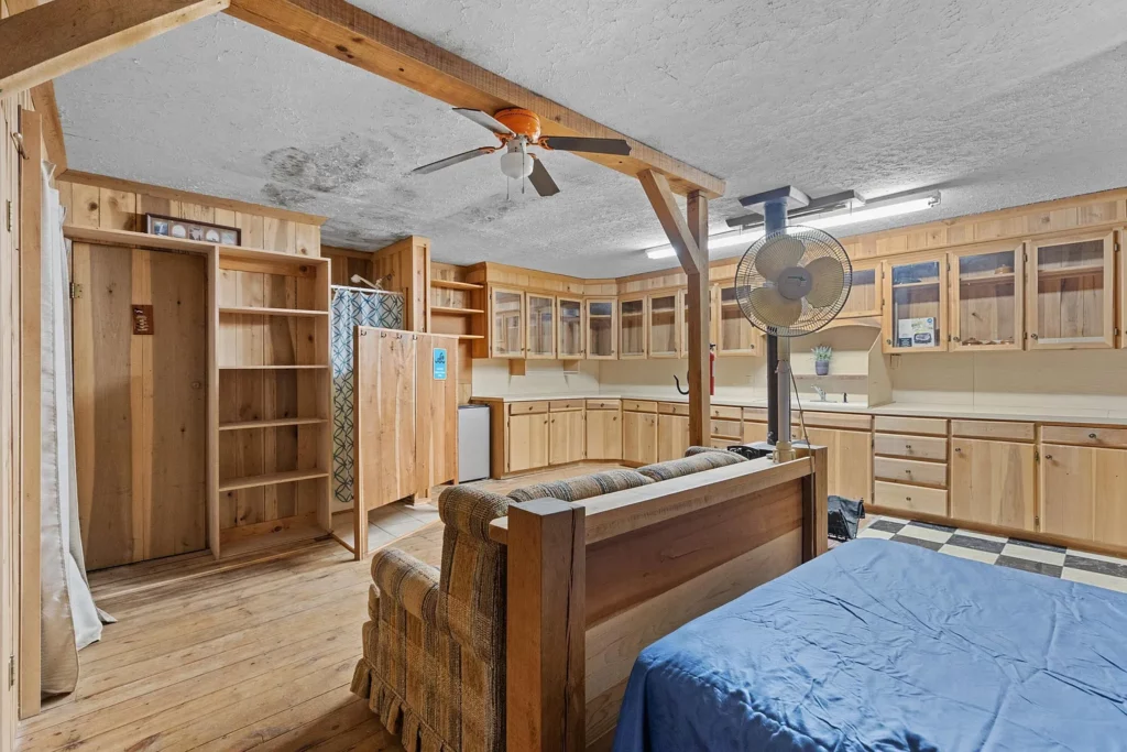 Log Cabin for Sale in Cosby Tennessee on 50 Acres with Pond, Cabins, and Mountain Views 3099 Mica Way, Cosby, TN 37722 Scottie Hooper realtor Cosby Tennessee