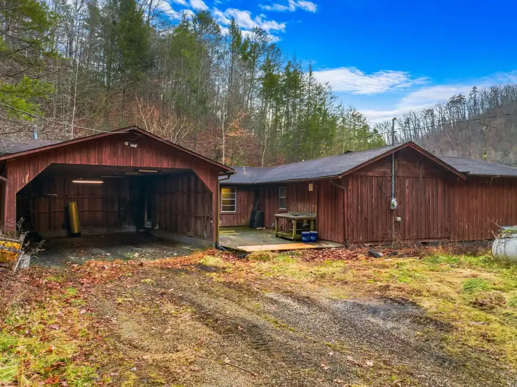 Log Cabin for Sale in Cosby Tennessee on 50 Acres with Pond, Cabins, and Mountain Views 3099 Mica Way, Cosby, TN 37722 Scottie Hooper realtor Cosby Tennessee