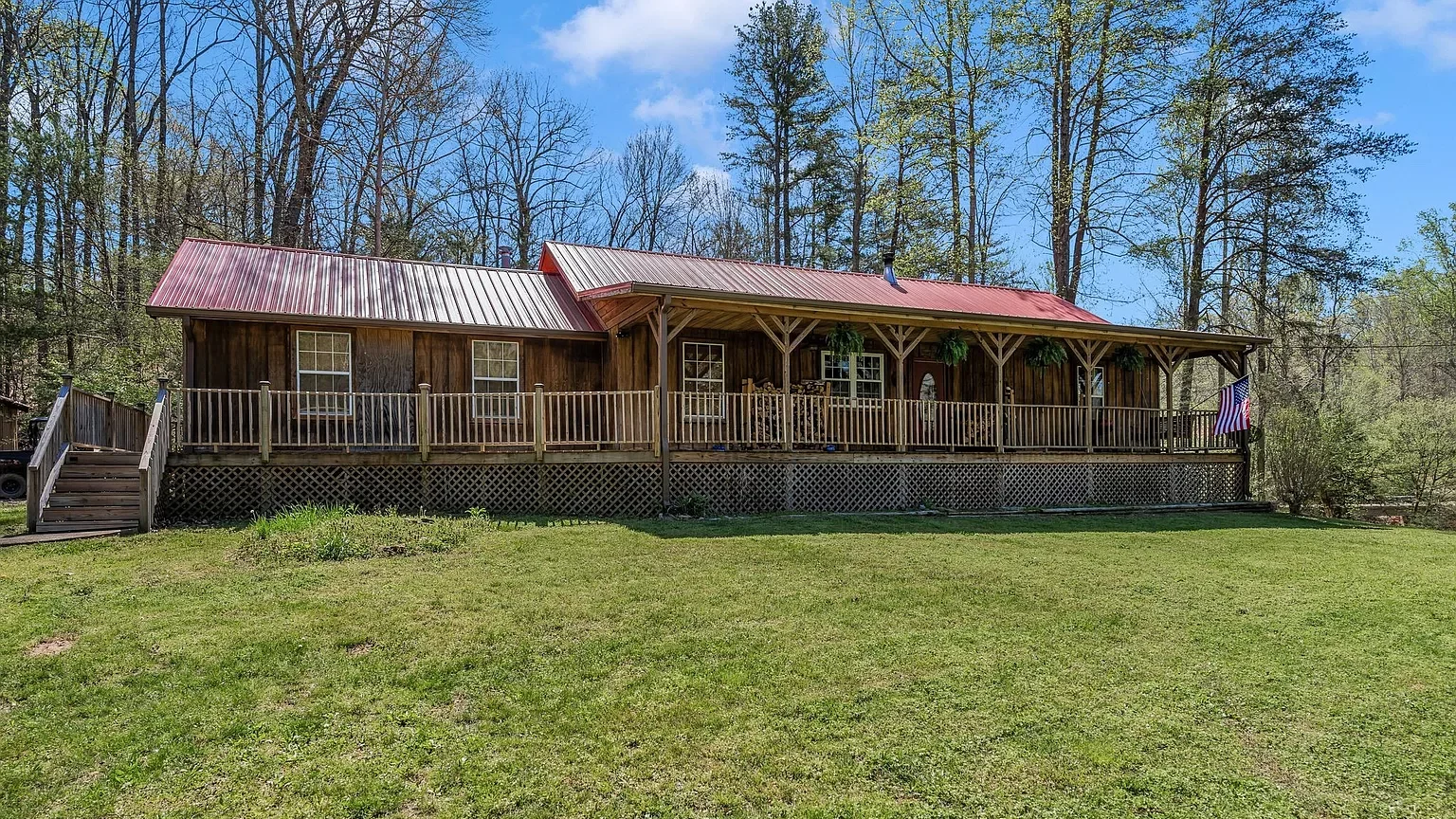Log Cabin Home with Creek on 12+ Acres for Sale in Nunnelly, TN