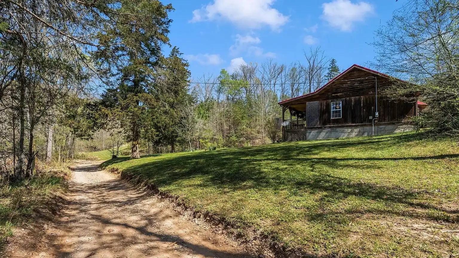 Log Cabin Home with Creek on 12+ Acres for Sale in Nunnelly, TN 6459 Old Mill Creek Rd, Nunnelly, TN 37137