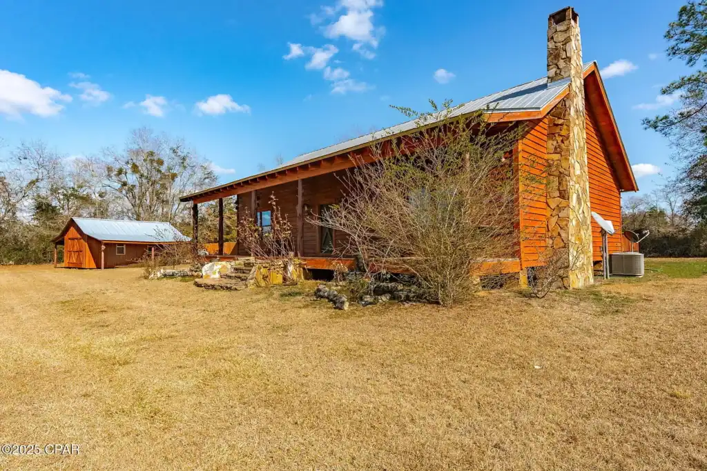 Off Grid Homestead Log cabin home for sale in Florida 2641 Highway 77, Chipley, FL 32428Off Grid Homestead Log cabin home for sale in Florida 2641 Highway 77, Chipley, FL 32428
