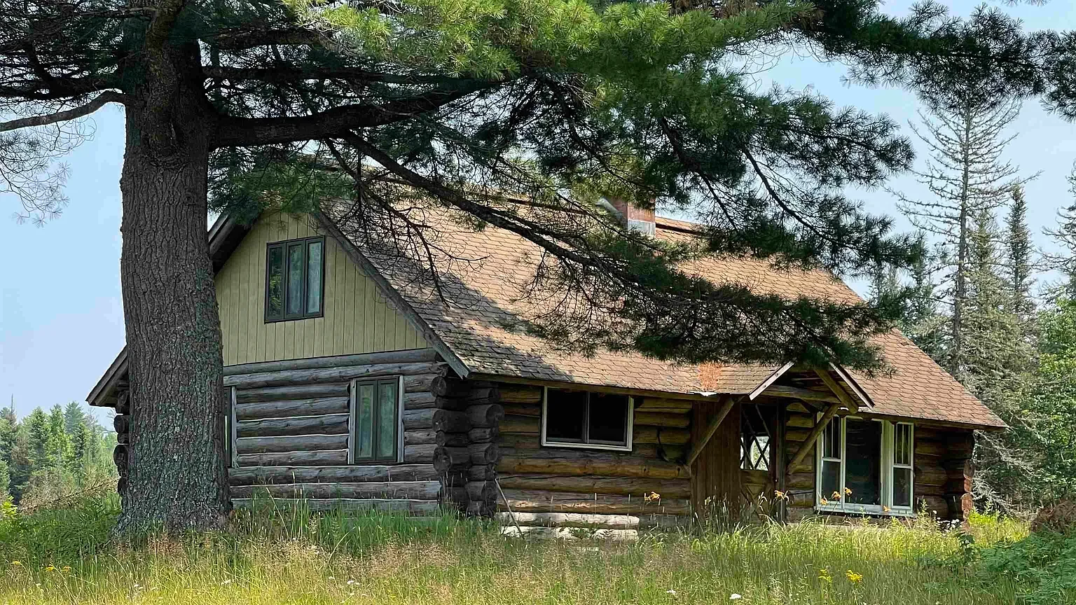 Off-Grid Log Cabin for Sale on 100 Acres in Covington, MI