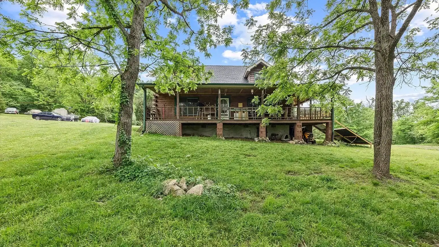 Log Cabin For Sale in Tennessee with Land 193 Horseshoe Bend Ln, Elmwood, TN 38560