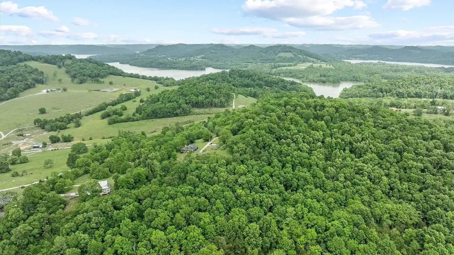 Log Cabin For Sale in Tennessee with Land 193 Horseshoe Bend Ln, Elmwood, TN 38560